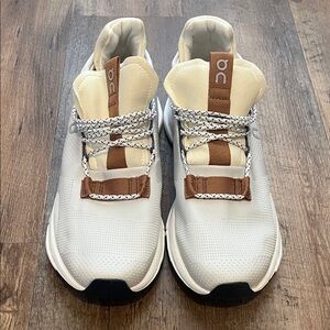 On Running Cream and Tan Sneakers